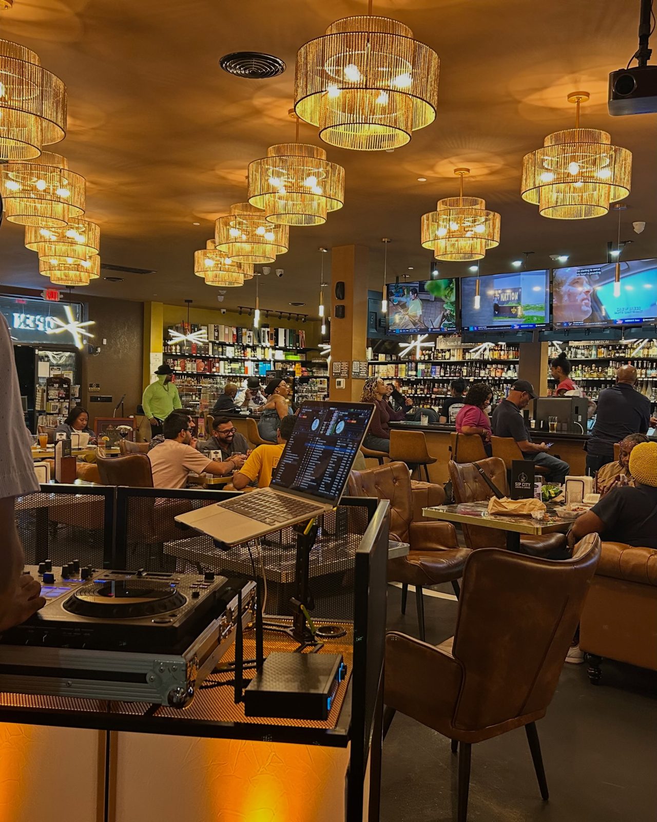 The crowd at Sip City Liquors & Lounge